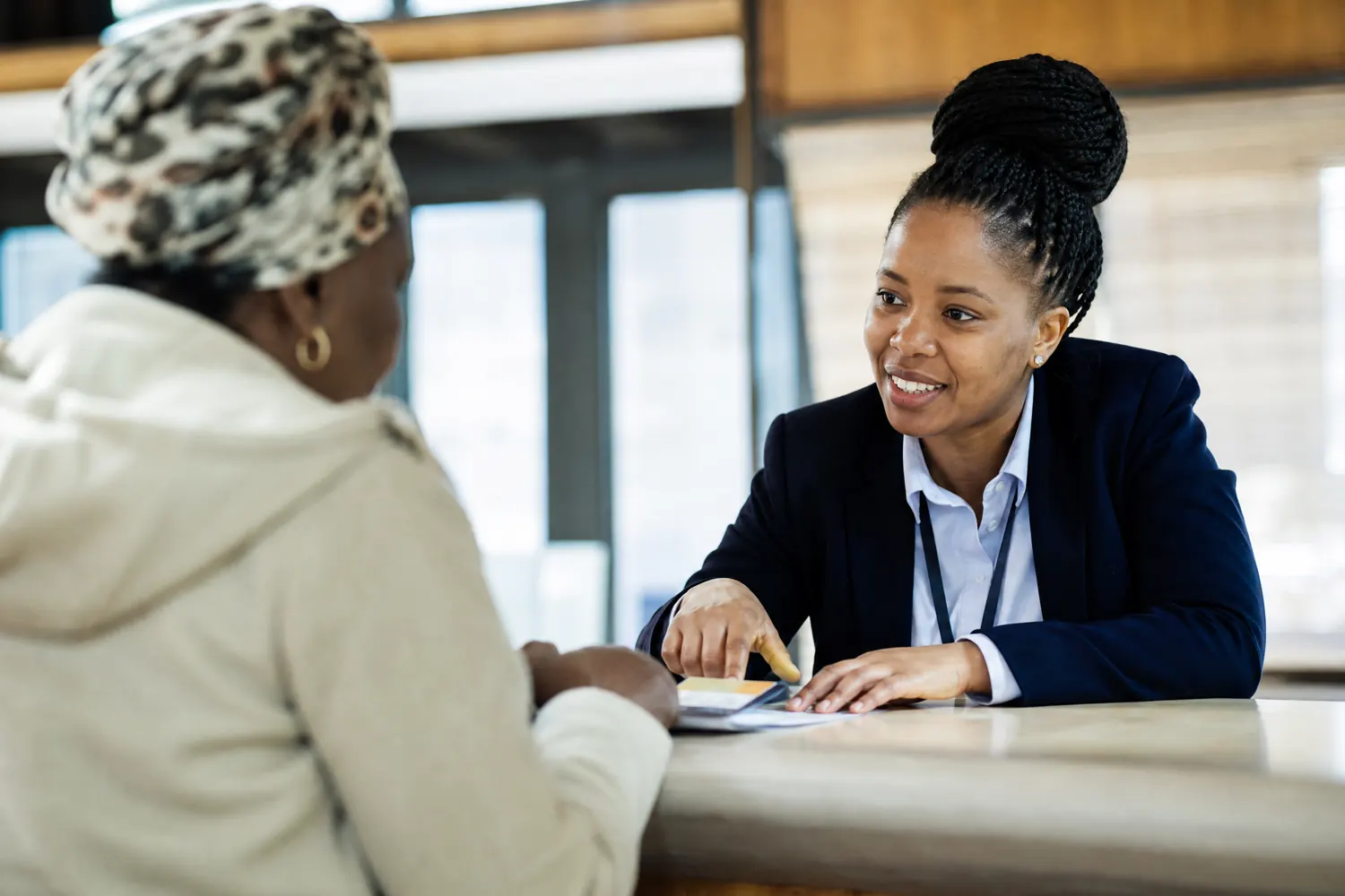 A customer service representative practising professional communication techniques in a role-play exercise.